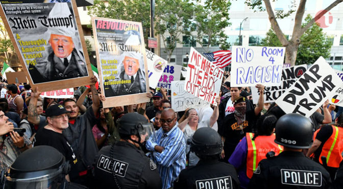Anti Trump protesters attack supporters at Rally