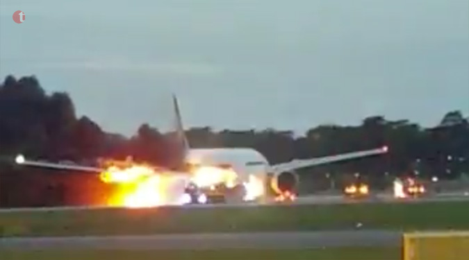 Singapore Airlines jet bursts into flames on emergency landing