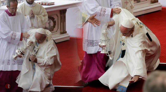 Pope Francis falls in Poland, escapes injury