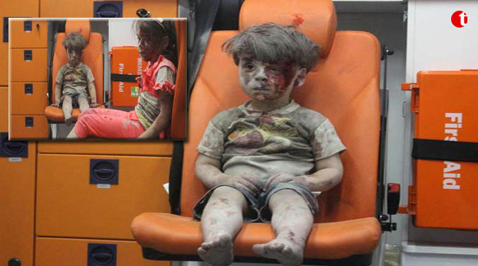 US calls dazed boy 'the real face' of Syria's war