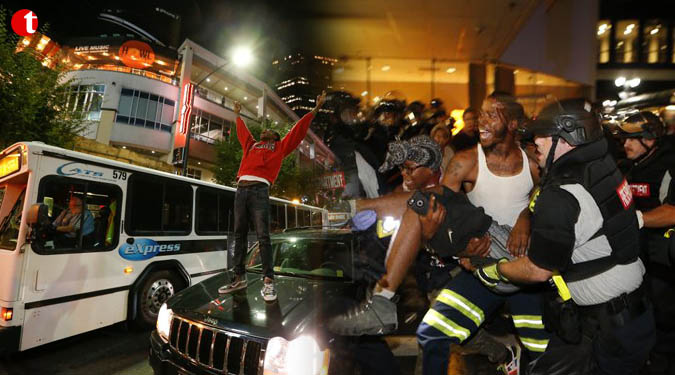 Emergency in Charlotte after protests over cop shooting black man