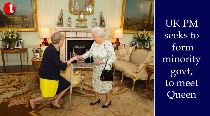 UK PM seeks to form minority government, to meet Queen