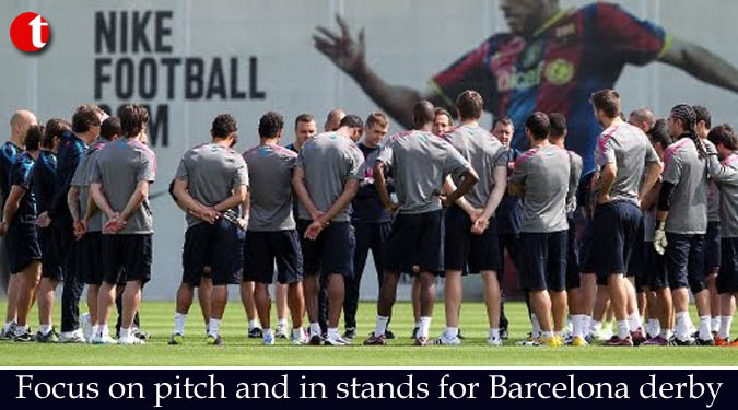 Focus on pitch and in stands for Barcelona derby
