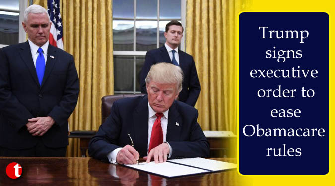 Trump signs executive order to ease Obamacare rules