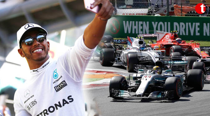 Hamilton not distracted by tax evasion charges