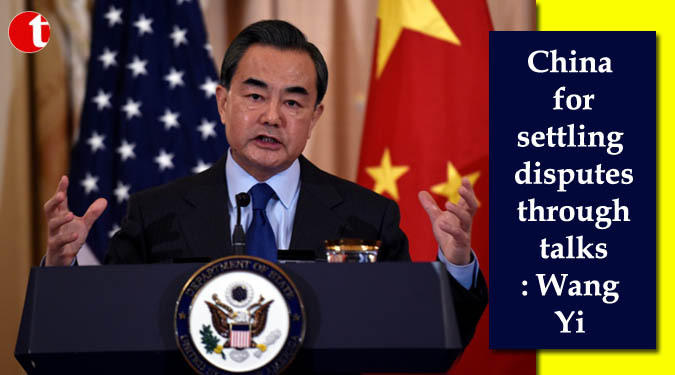 China for settling disputes through talks: Wang Yi