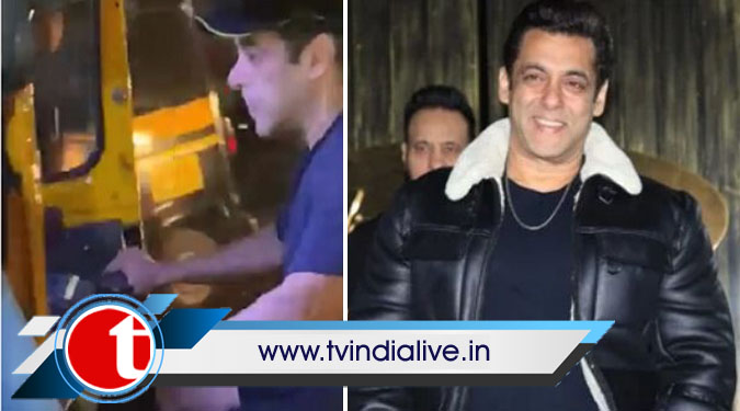 Salman Khan drives an auto-rickshaw on a busy street